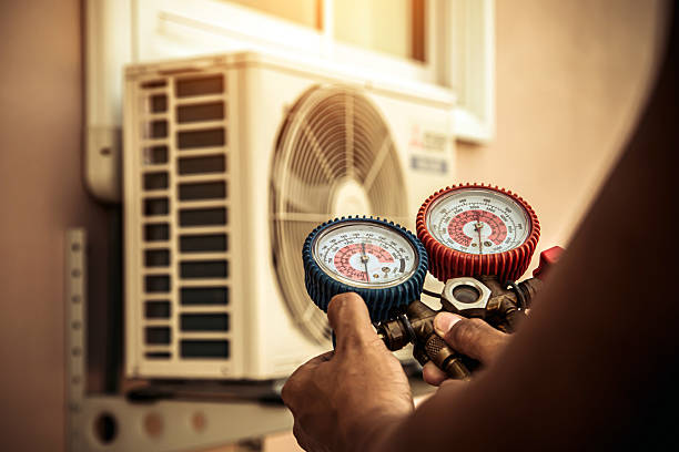 Professional Hvac technician working in Marine, IL